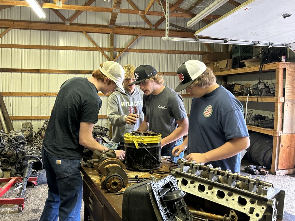 Students working in auto class
